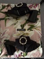 Dolce & Gabbana mules noires P. 36