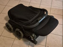 Poussette maxi-cosi pliante compacte