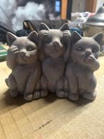 Statue avec 3 chats