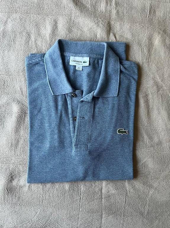 Lacoste Polos: Polo Lacoste bleu classic fit – Neuf (Voir description) à Genthod par mar_g8vn