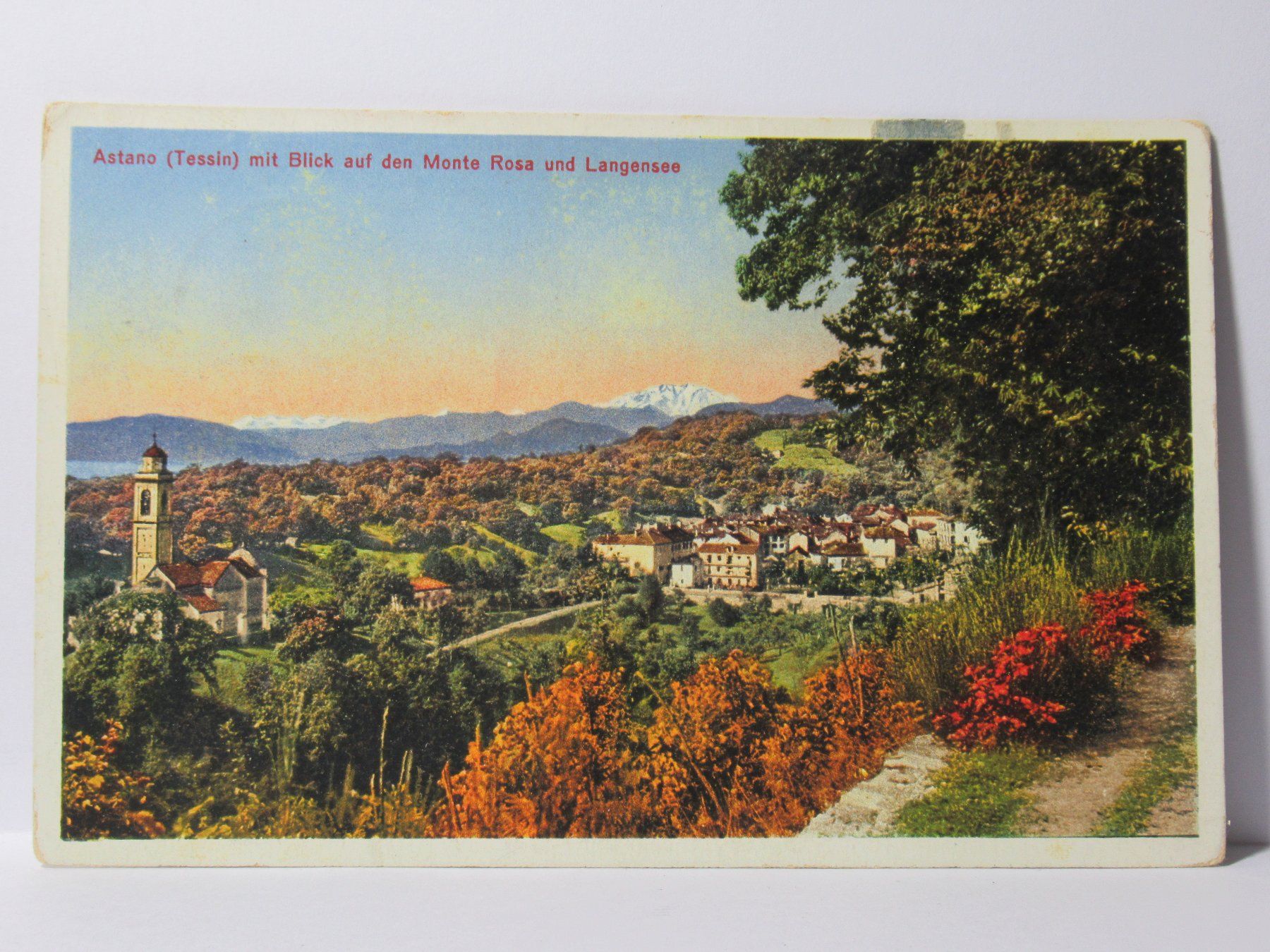 Cartoline postali: Astano mit Blick auf den Monte Rosa & Langensee , Kirche – Usato da Grenchen venduto da Bluemchen1900 1