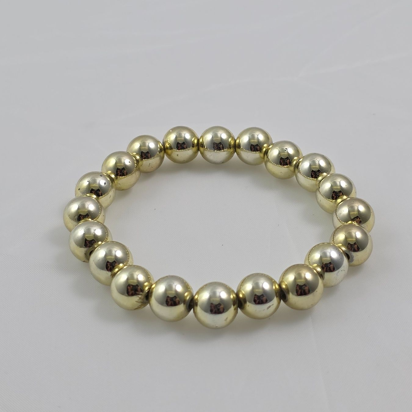 Bracciali & Braccialetti: Modeschmuck: Goldfarbenes Armband mit Kugeln 621 – Usato da Wald ZH venduto da Martin79