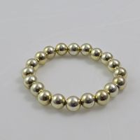 Modeschmuck: Goldfarbenes Armband mit Kugeln 621