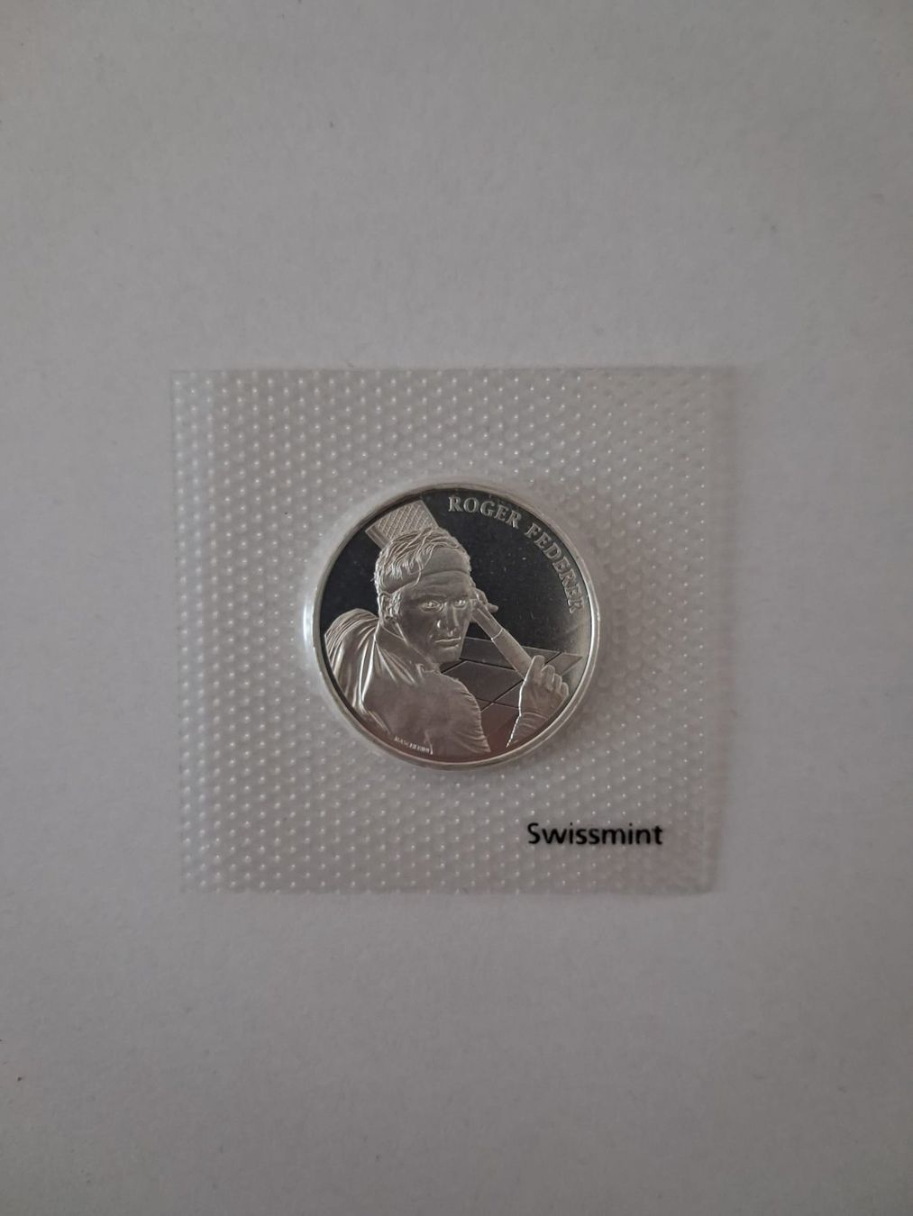 Tutti le monete: Roger Federer, pièce commémorative suisse de 20 francs – Nuovo e nell'imballaggio originale da Dombresson venduto da Saluro