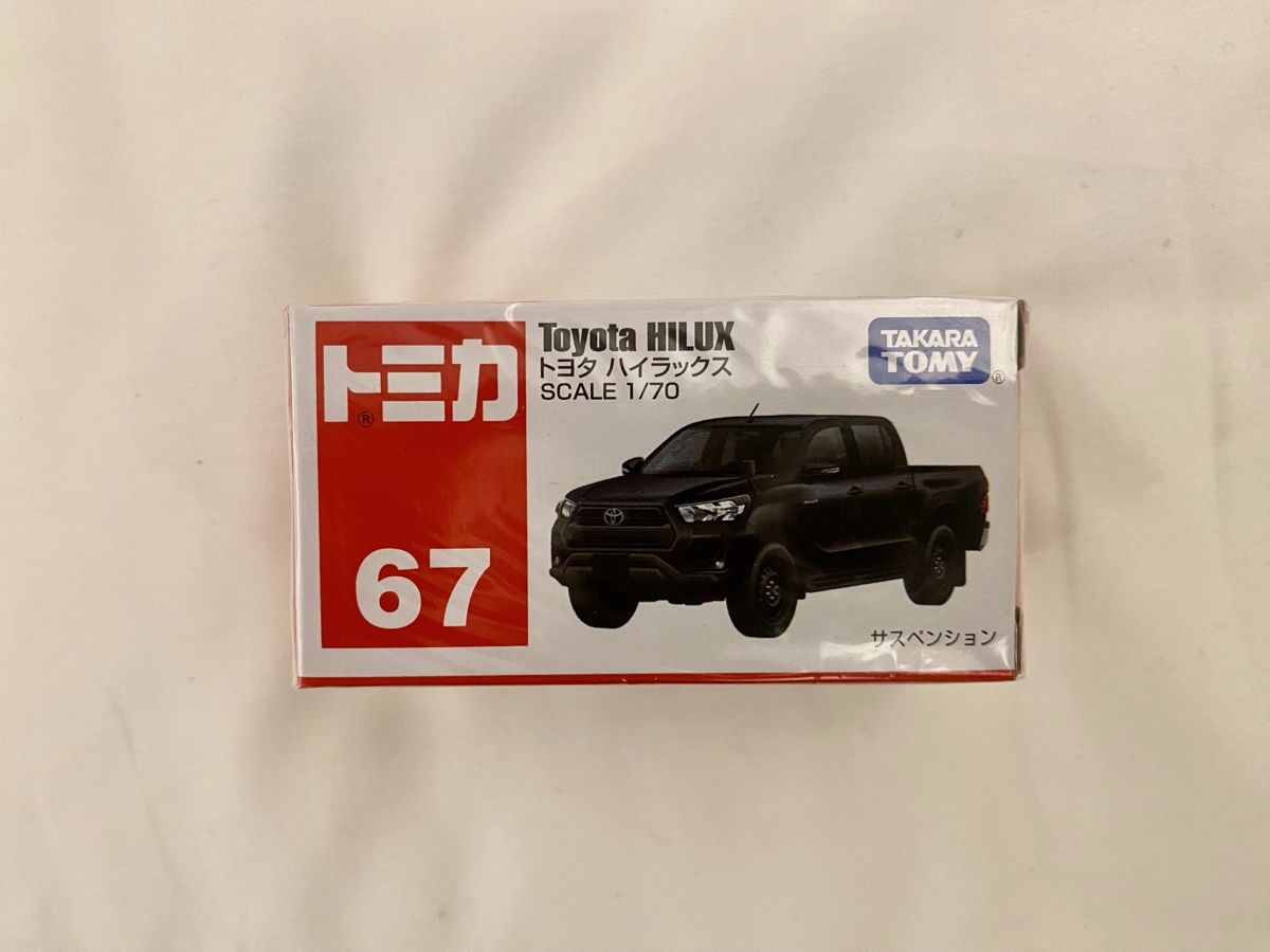 Toyota Modellini d'auto: Tomica Toyota Hilux – Nuovo e nell'imballaggio originale da Oberembrach venduto da theZaz