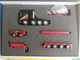 MAN E2000 mit Euro lowded trailer von Conrad Modelle 1/50
