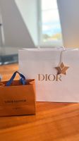 Geschenktaschen Dior und Louis Vuitton