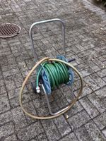 Schlauchwagen mit Gartenschlauch und Spritze gebraucht