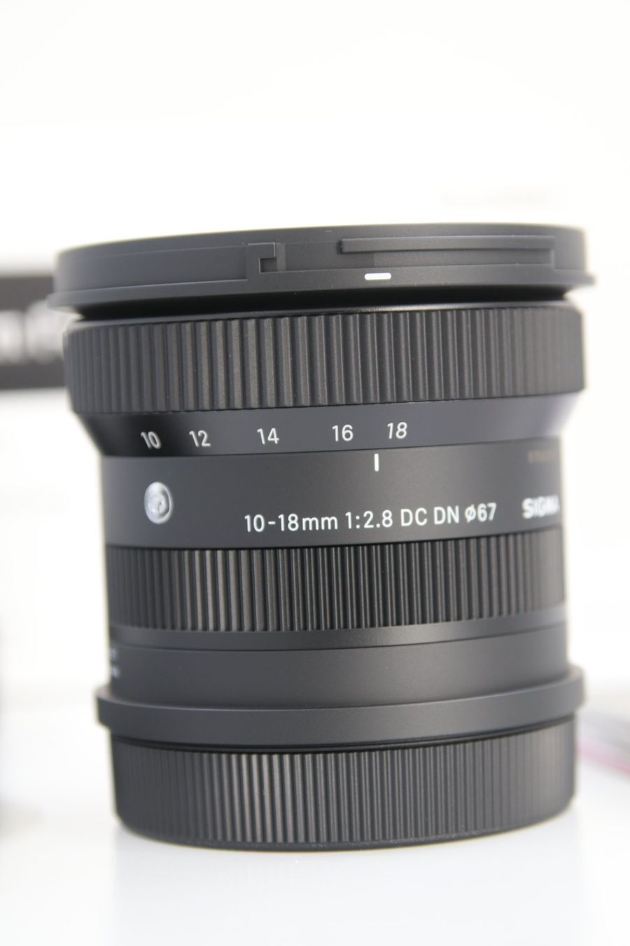 Sigma Obiettivi: Sigma 10-18mm 2.8 DC DN L-Mount / NEU – Nuovo e nell'imballaggio originale da Zofingen venduto da OWYSSAG 3