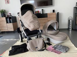 Schöner Kinderwagen mit viel Zubehör 