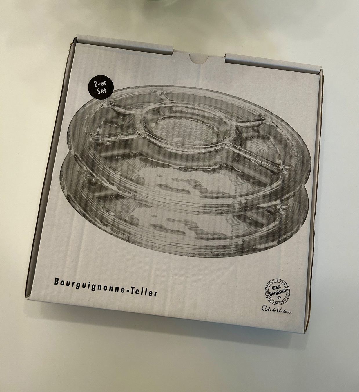 Glasi Hergiswil Piatti: Glasi Hergiswil Fondue Teller NEU – Nuovo e nell'imballaggio originale da Klingnau venduto da martinak79