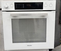 Four encastrable Miele blanc bon état de marche