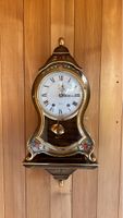 Elixa Wanduhr mit Pendel floral verziert 