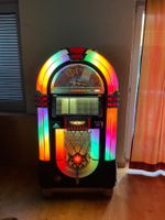 Rock Ola Jukebox Bubbler mit 100 CD's bestückt