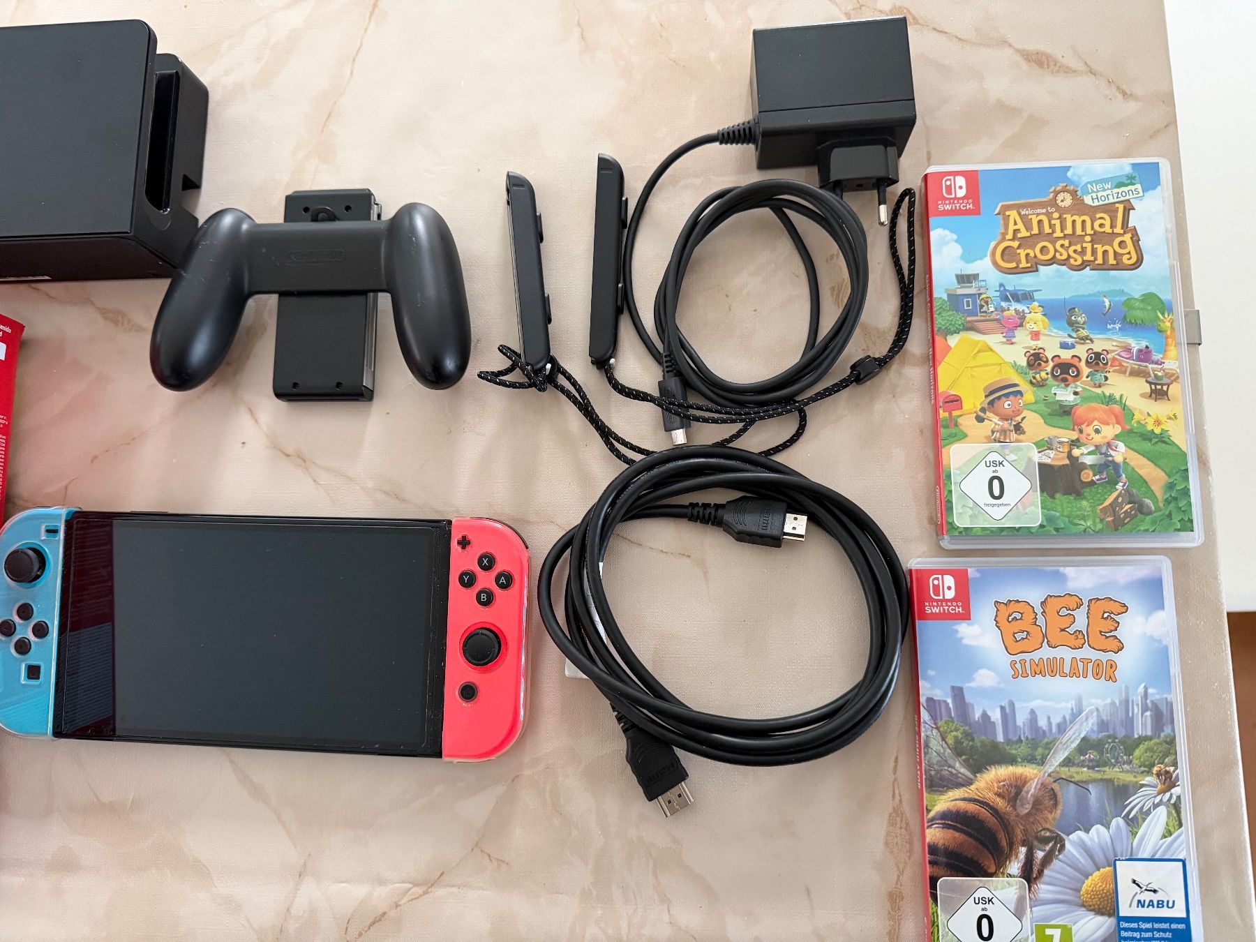 Nintendo Console: Nintendo Switch OLED mit Spielen – Usato da Oberägeri venduto da kaitanja 1