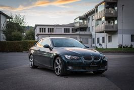 BMW 335i Cabrio dunkelgrün metallic 
