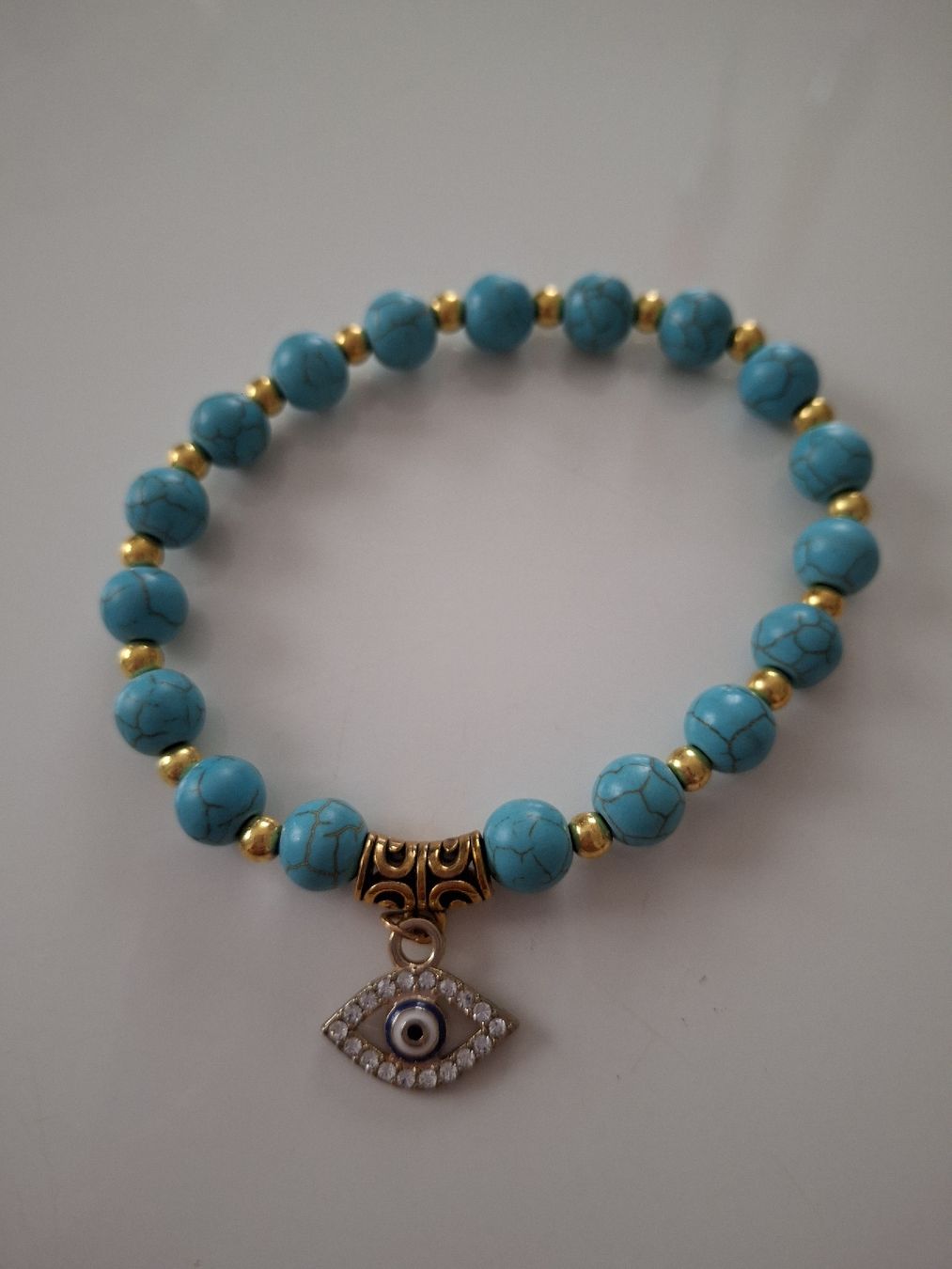 Armbänder & -reifen: Bracelet turquoise avec oeil porte chance – Neu (gemäss Beschreibung) aus Lausanne von Cognitia