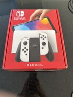 Nintendo Switch OLED White Console Bundle w Mario Kart 8