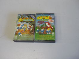 2x Kassetten Schlümpfe - Hitparade + neuste Hits