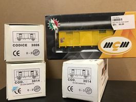 3x M.C.M. Güterwagen HO +1 gelben