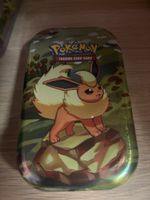 Pokemon Prismatic Evolutions: Flareon Mini Tin
