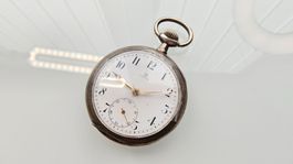Ancienne montre de poche en argent Omega