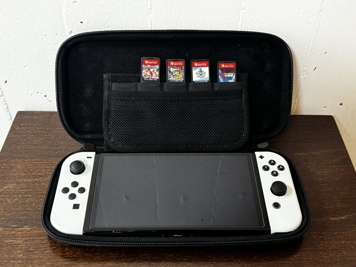 Nintendo Console: Nintendo Switch Oled, Pro Controller und Spiele – Usato da Binningen venduto da mareger 1
