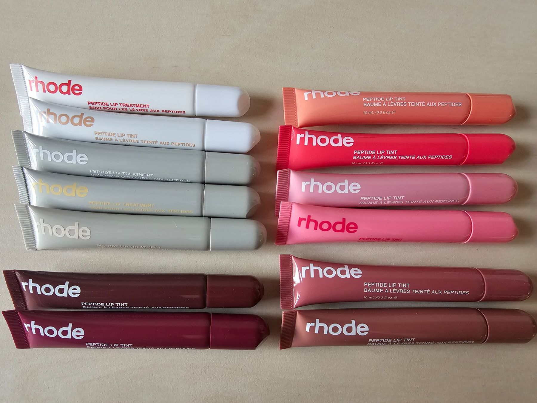 Soins du visage: 13 Stück Rhode Peptide Lip Tint – Neuf (Voir description) à Balterswil par Dikdik1992
