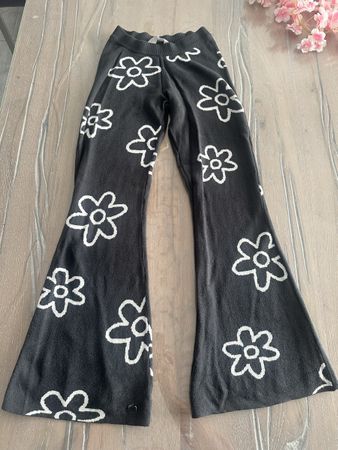 H&M Strickhose Blumenmuster schwarz Grösse 140 