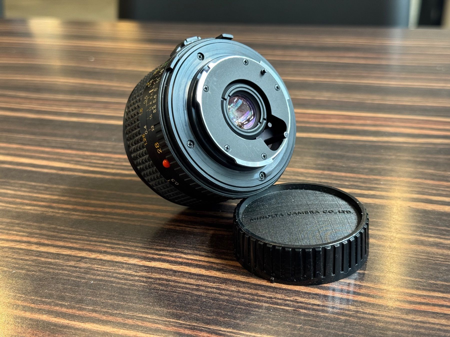 Minolta Obiettivi: Minolta MD 28mm 1:3.5 – Usato da Zürich venduto da KochphotoAG 2