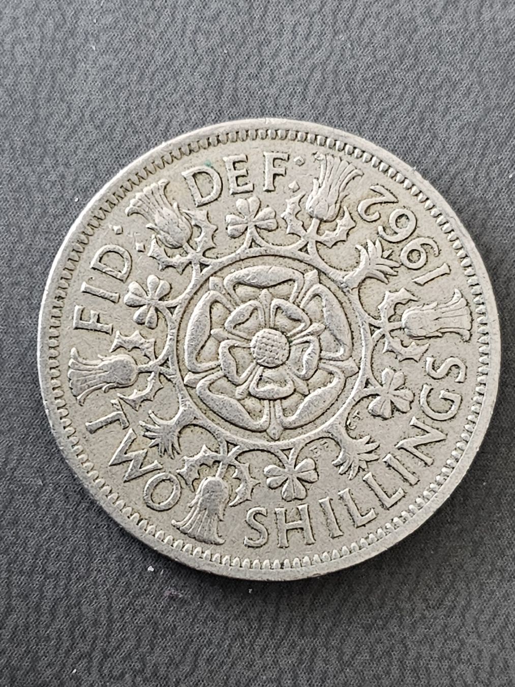 Tutti le monete: 2 shilling 1962 – Usato da Nidau venduto da Misterpix