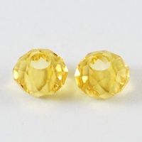 9 Glasschliffperlen 10x6mm gelb