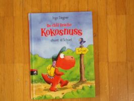 De chli Drache Kokosnuss chunt id Schuel
