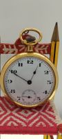 montre de poche dorée