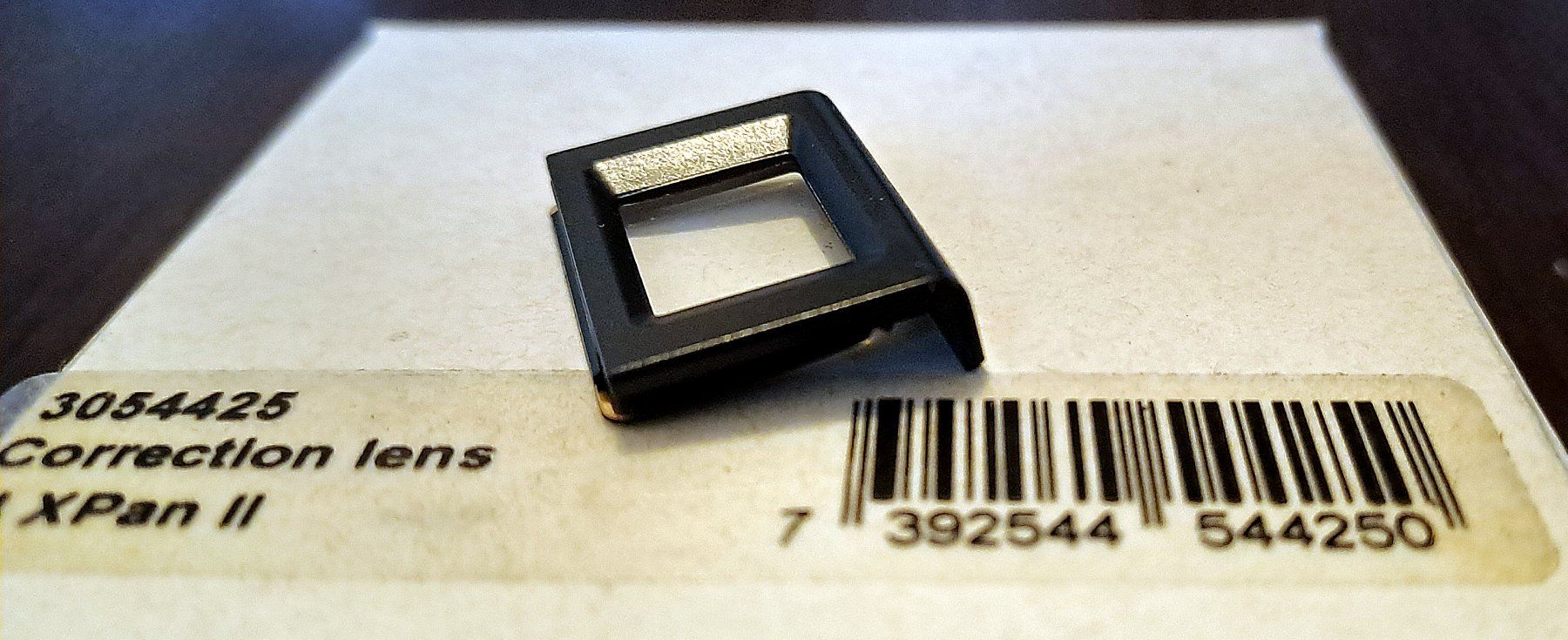 Hasselblad Fotocamera: Hasselblad Xpan (1&2) correction lens -4 – Nuovo e nell'imballaggio originale da Genève venduto da Blowupster