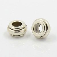 2 Perlen Metall Ringli 4,5mm Loch