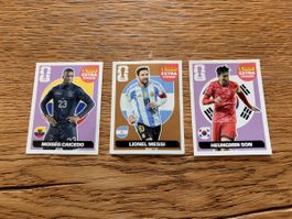 Panini WM Sticker: Messi, Son, Caicedo. Sommer 2022.