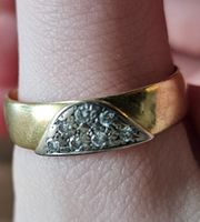 Goldring 18 Karat (750) mit 7 Steinen/ 6 gr.