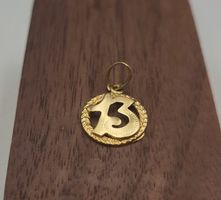 18 Karat 750 Gold Anhänger 13 mit Lorbeerkranz