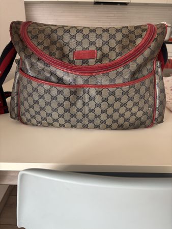 Gucci Wickeltasche stark gebraucht