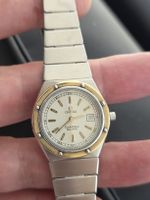 Montre Omega Constellation Quartz  or/acier