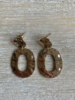 Boucles d'oreilles créoles ovales dorées tendance