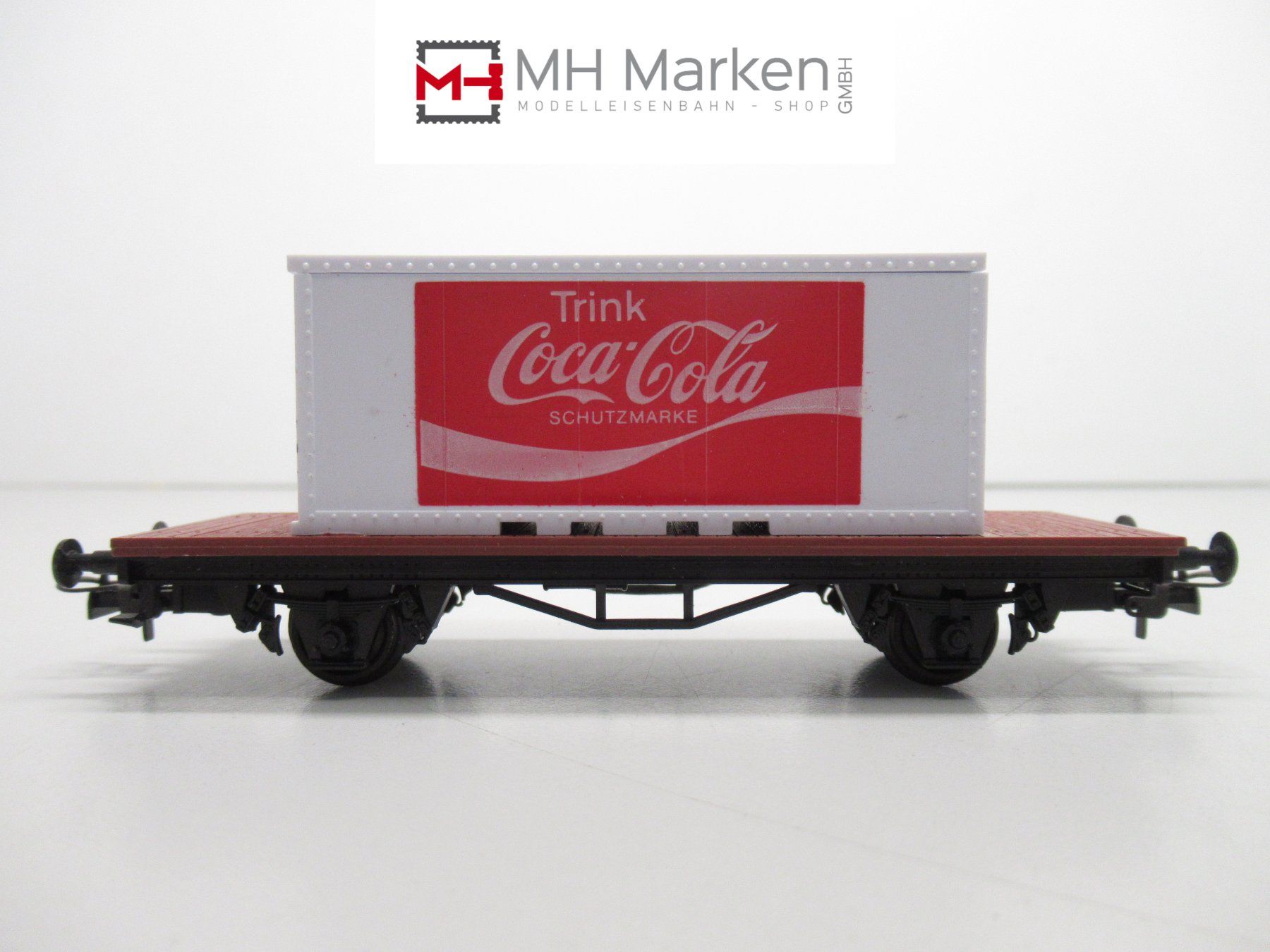 Liliput Modelleisenbahnen: Liliput Plattformwagen mit Coca-Cola Container Deutsch DC H0 – Gebraucht aus Basel von mhmarken