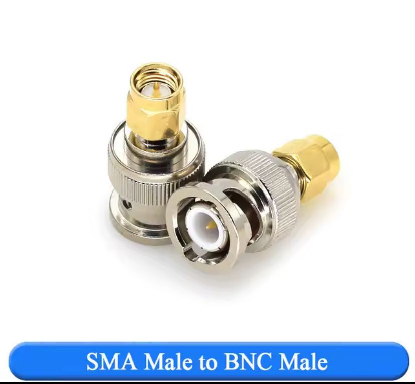 Radiocomunicazione: Amateurfunk SMA Stecker auf BNC Stecker Adapter – Nuovo e nell'imballaggio originale da St. Gallen venduto da Radiomania-Schweiz