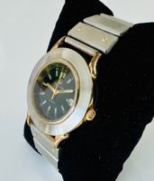 BULOVA Quartz bicolore 35 mm en bon état, pile neuve