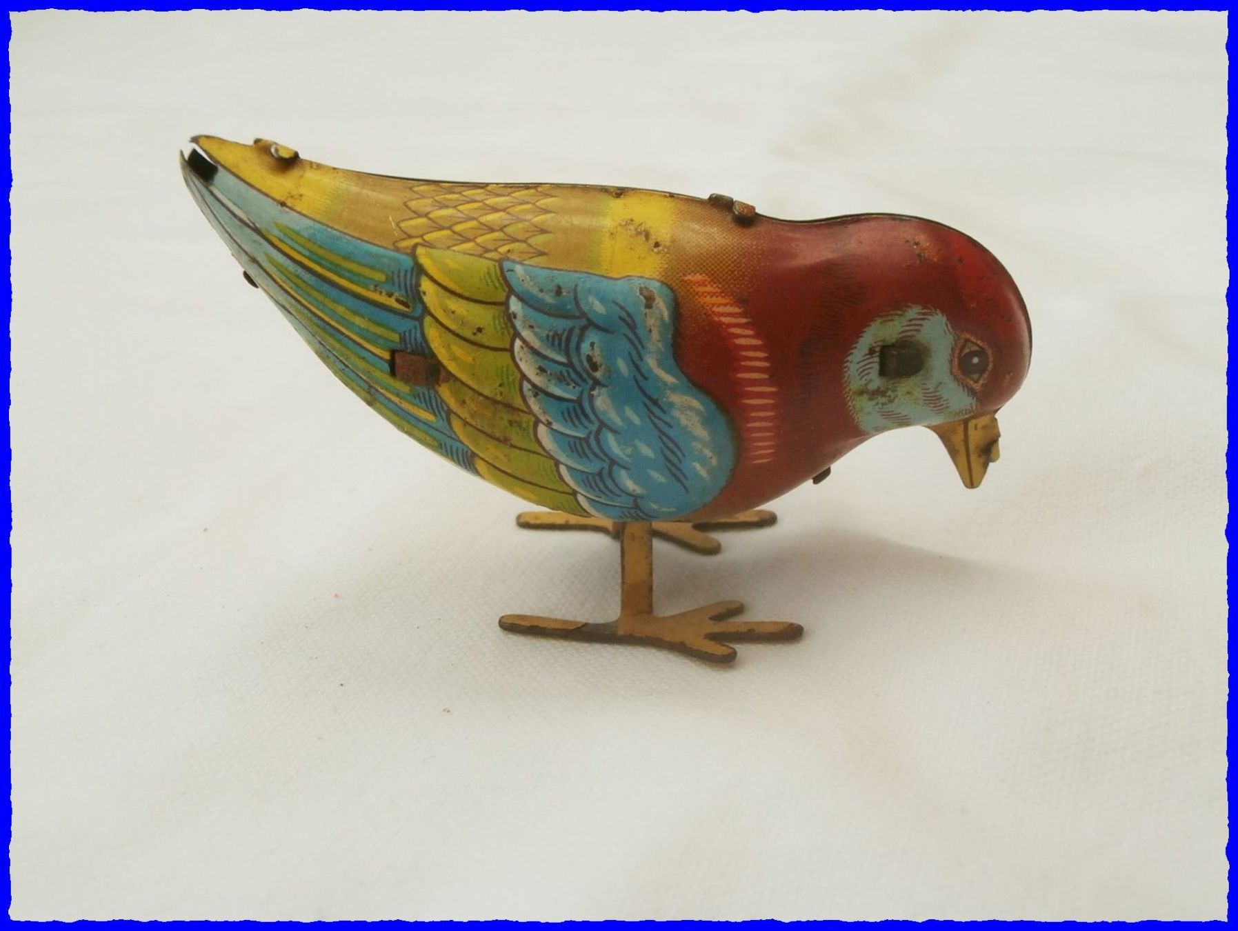 Giocattoli: antikes Blechspielzeug: Pickender VOGEL - mit Aufzug – Usato da Worblaufen venduto da Re_mo81