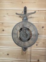 Ancienne pendule murale en bois