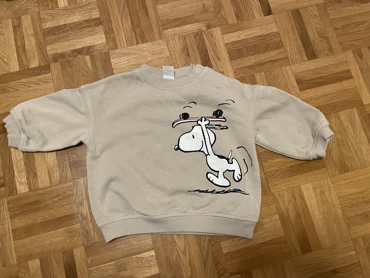 H&M Pulls et sweat-shirts: Pull H&M Bébé Snoopy PEANUTS, 6-9 mois – Neuf (Voir description) à Versoix par Pti-pois