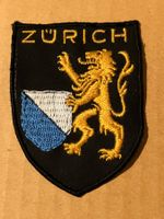 Vintage cloth stitch on embroidered badge Zurich