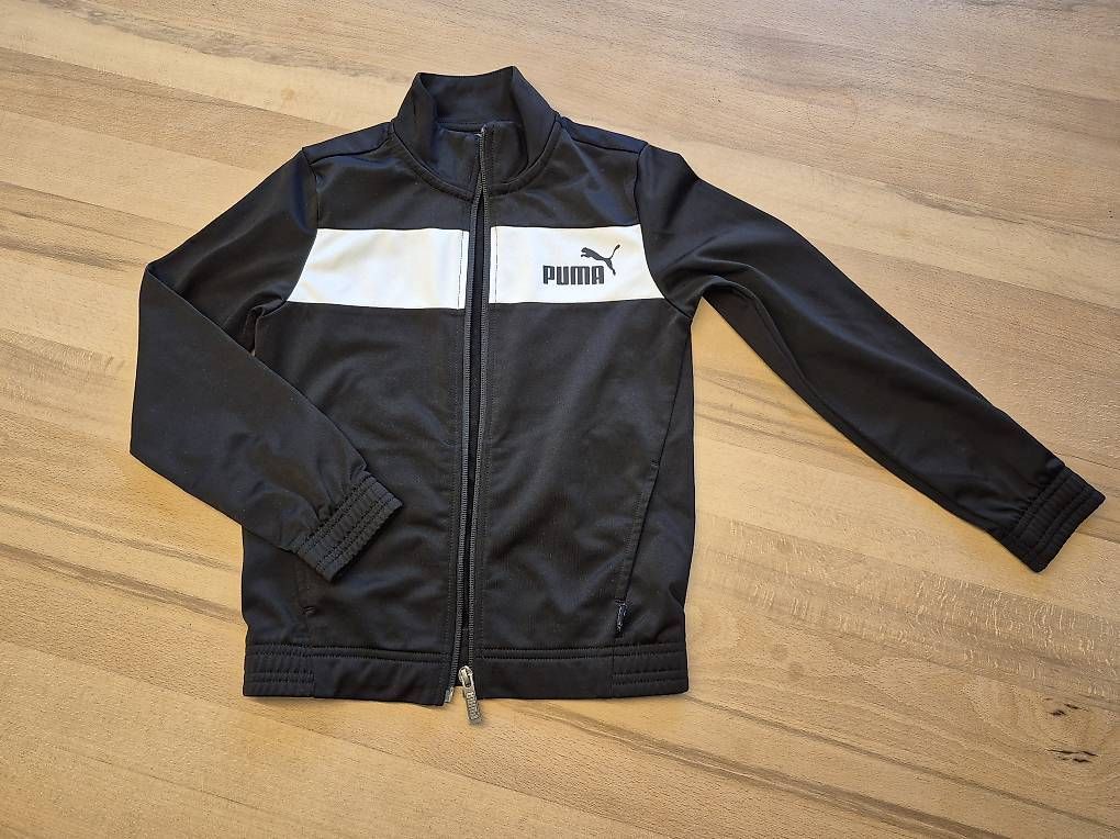 Giacche: Trainerjacke Puma schwarz Gr. 128 - neuwertig – Usato da Buttisholz venduto da Ottilia31